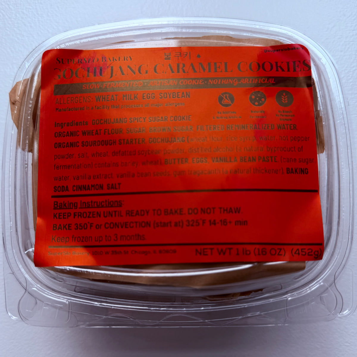 Four frozen Gochujang cookies from SuperSlo Bakery displayed on a plate, showcasing their spicy, savory Korean pastry appearance.